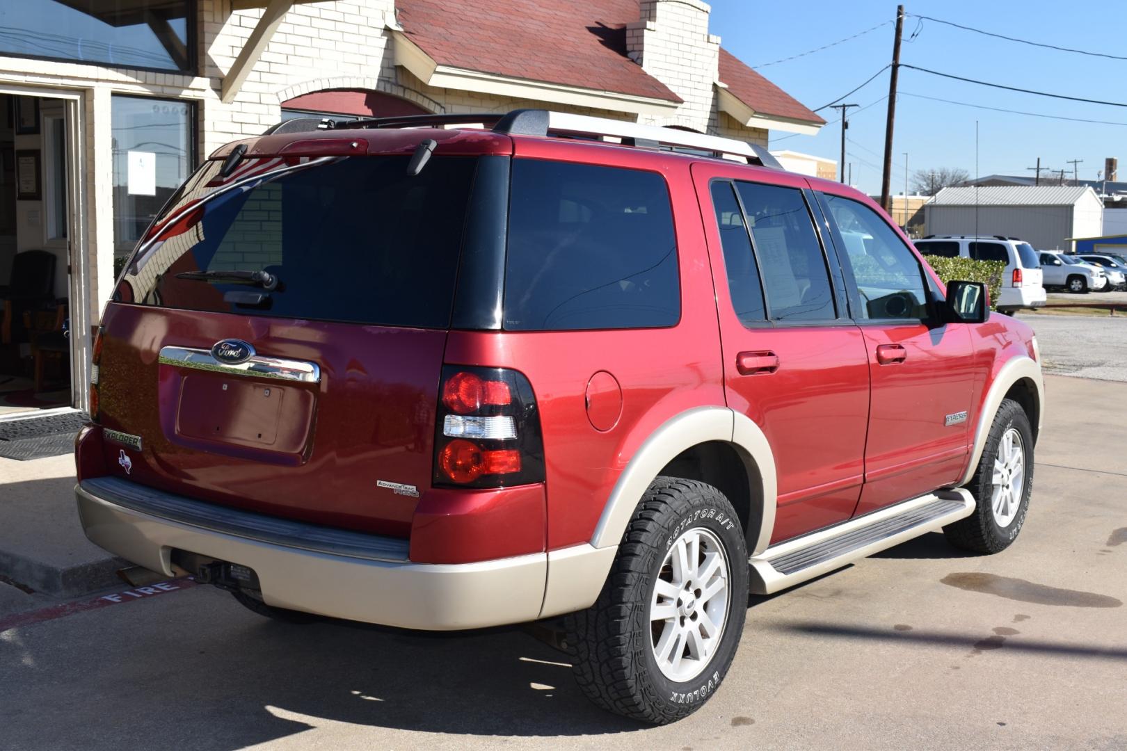 2006 Red /Tan Ford Explorer Eddie Bauer 4.0L 2WD (1FMEU64E76U) with an 4.0L V6 SOHC 16V engine, 5-Speed Automatic Overdrive transmission, located at 5925 E. BELKNAP ST., HALTOM CITY, TX, 76117, (817) 834-4222, 32.803799, -97.259003 - Buying a 2006 Ford Explorer can offer benefits such as affordability, availability of parts, spacious interior, towing capability, and off-road capability if equipped with the appropriate package. Additionally, older vehicles like the 2006 model may have simpler technology, making maintenance and re - Photo#4